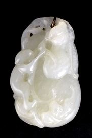 Lot 261 -Carved White Jade Toggle, 19th Century
