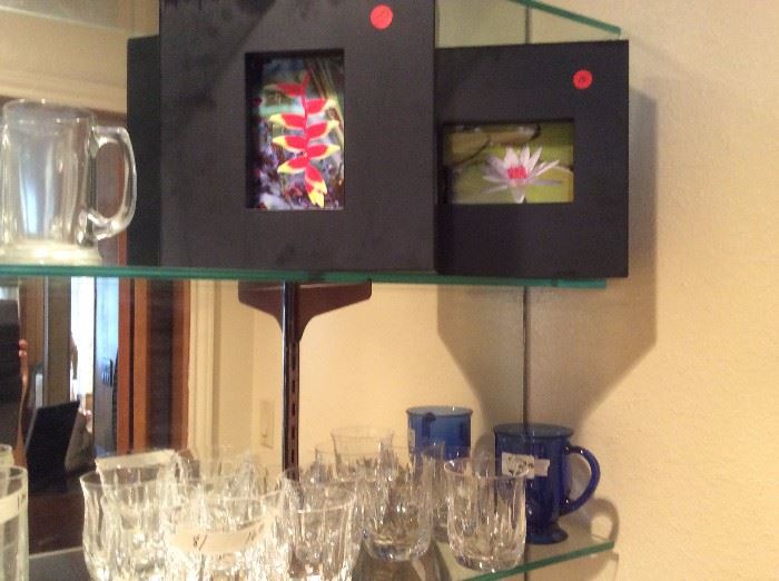 4 flower art pieces and glassware