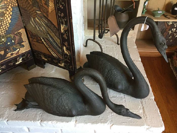 Pair of patinated large Bronze Swans.