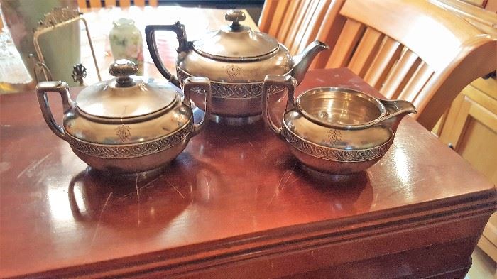 Tiffany tea set.  Love that warm old world luster.