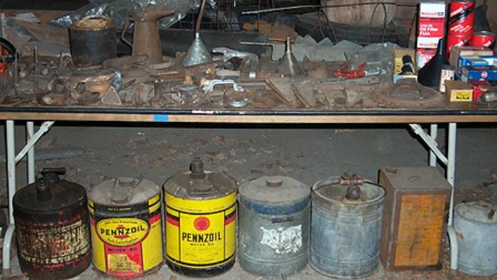 Old tools, oil and gas cans