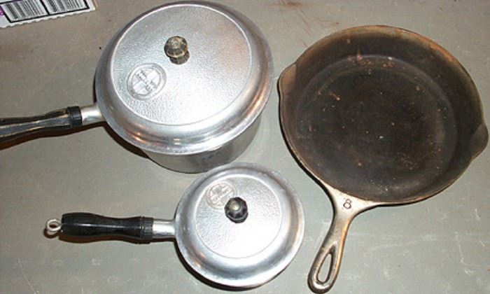 Griswold slant 8 cast iron frying pan, aluminum pots w/ lids