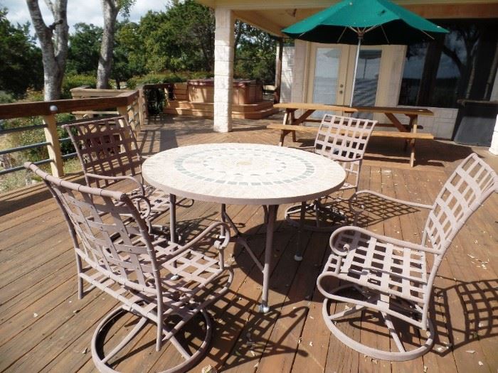 Outdoor set with 4 rockers and inlaid table, another smaller table available