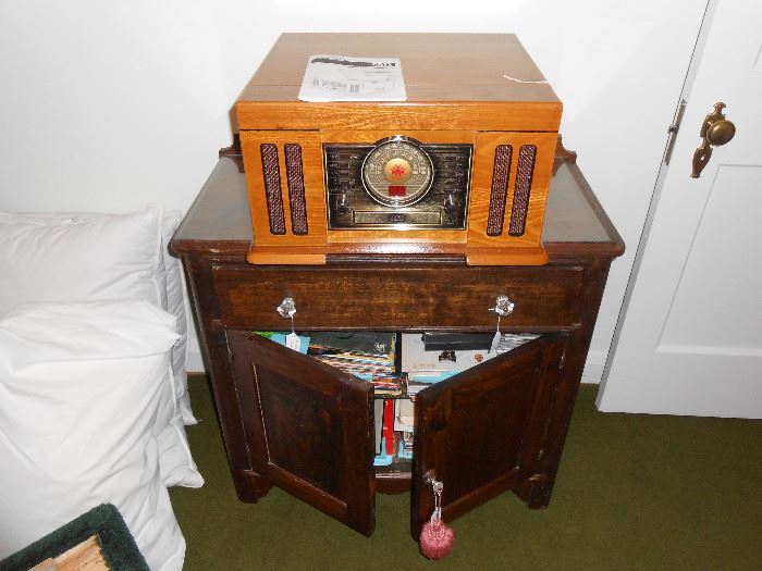 Little cabinet, records, CD's, tapes, tape recorder, Crosley EC, goose down pillows, more.