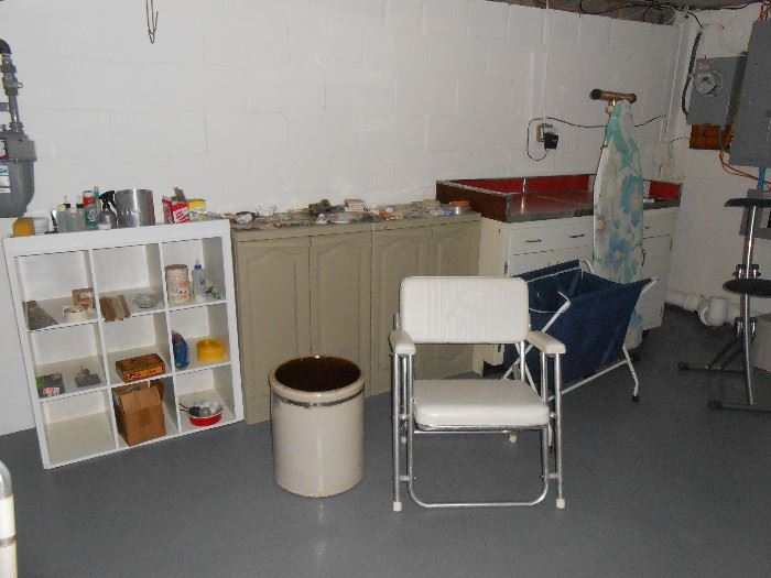 Miller pottery crock, boat chair, laundry sorter, ironing board, ironing chair, iron, more.