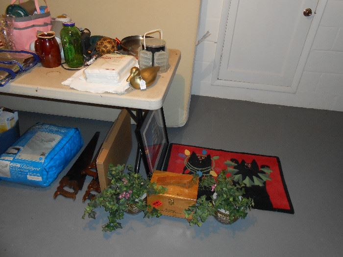 $5.00 each item area.  Christmas kitties rug, ceramic pots and artificial ivy, USCG Eagle picture, shoe shine kit, bucket of nails and screws, Revere Ware copper bottom frying pan, more.