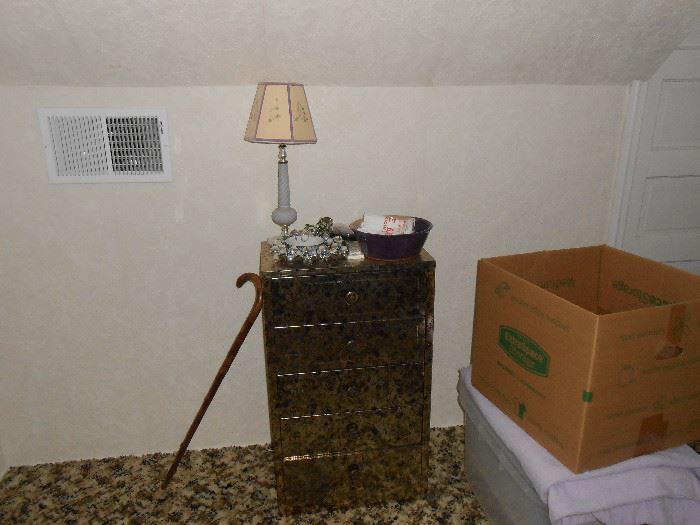 Small metal chest, purple lamp, more.