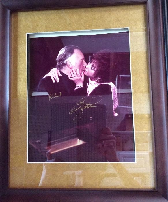 Framed Picture of Elizabeth Taylor and Richard Burton kissing, signed in gold, gifted by Brook Williams, godson of Richard Burton to Michelle, one of only 2 or 3 in existence.