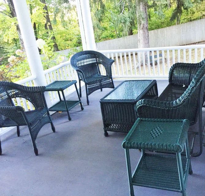 Sorry, the porch isn't included with this great wicker set.  But if you have one like it, the set will look just as good! 