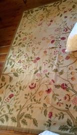 Beautifully needlepointed area rug, approx. 4' by 6' 