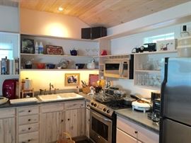 The kitchen in the amazing upstairs apartment over the garage -- you can start you own kitchen with the stuff here.