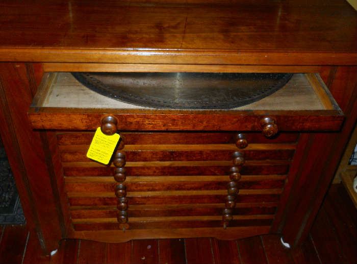 drawers filled with large metal disks for the Kalliope upright  music box