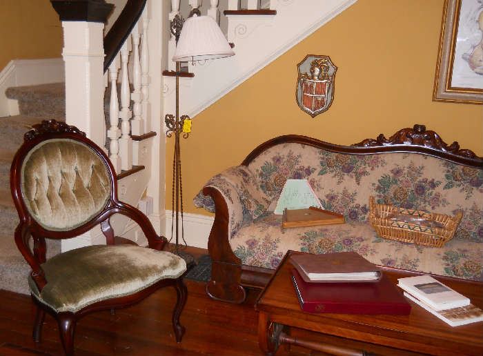 Victorian style side chair, vintage floor lamp, vintage sofa, coffee table, etc.