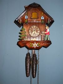 Hubert Herr coo coo clock with wood cutter and chimney sweep