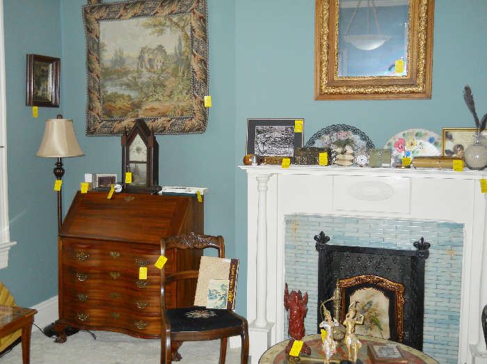 gold framed mirror, hanging tapestry, mahogany slant front desk, Steeple clock, floor lamp, rose back tapestry seat chair, etc.
