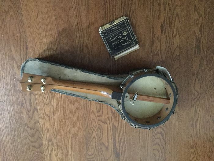 Sovereign 4 string, open back banjo or ukulele. 1920s.