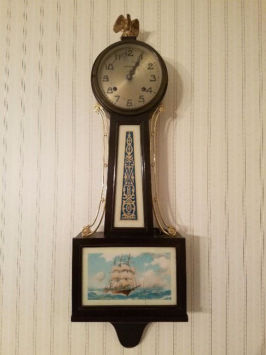 Antique clock with reverse painted glass of ship