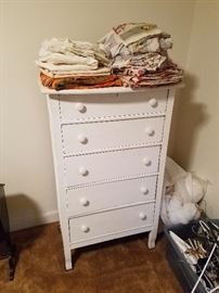 white painted dresser in sewing room