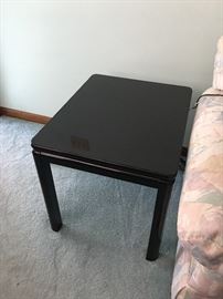 Black lacquer end table, one of two
