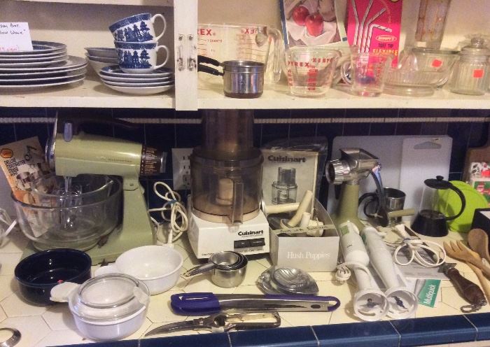 Kitchen items: Set of Johnson Bros. Willow Ware, Pyrex measuring cups, avocado green Sunbeam MixMaster mixer, Cuisinart (Model DLC-8E), utensils, Braun immersion blenders & more