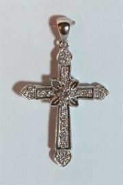 14K Cross Pendant with 25 round Brilliant Diamonds. total weight of Approx .40 Carats.