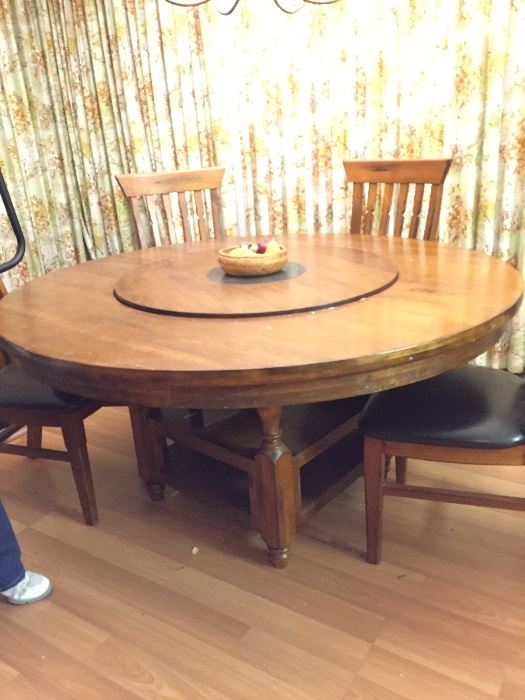 Round table unusual base and lazy Susan. 6 chairs