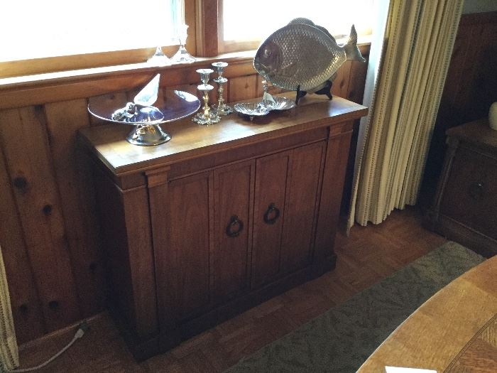 Serving pieces, exceptional narrow (12" deep) two door solid wood cabinet purchased at Willis Wayside in 1970