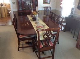 Duncan Phyfe Dining Room table with 8 Chippendale Chairs - Two King/Arm Chairs - striped fabric for seats.