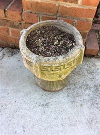 Several pairs of these concrete Urns