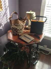 Coach Purses - One never used. Alligator like bag- and tons more handbags. Great Octagon table