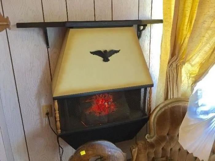 1960's Mid Century Flame Electric Log Heater Fireplace. Fireplace works.  Don't miss out on this unique piece. 