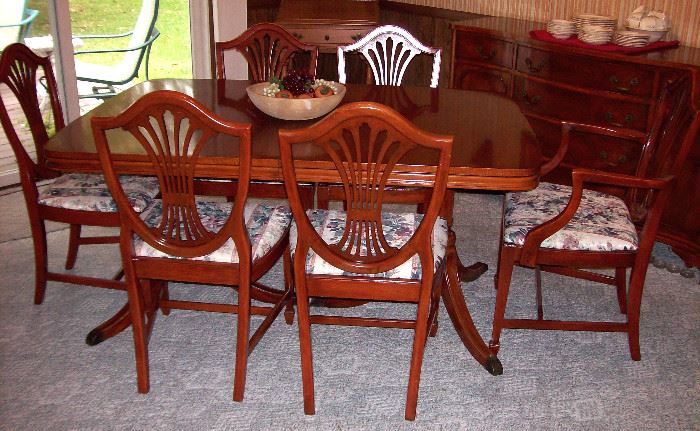 Dining table, three leaves, five side chairs & one host chair