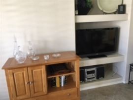FLAT SCREEN TELEVISION, (SONY) STORAGE CONSOLE CABINET OR BAR, HOME ELECTRONICS AND DECOR