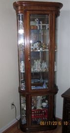 curio $125  full of hummels and Roy. doulton