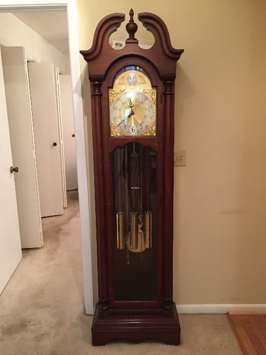 Working Colonial grandfather clock, approximately 30 years old.