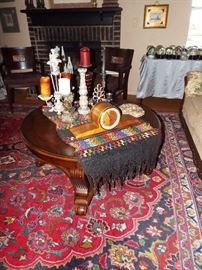 ORIENTAL RUG, COOL ROUND NEWER TABLE, 1950'S MANTLE CLOCK AND TONS OF DECORATIVE CANDLE STICKS