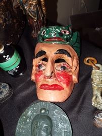 DAY OF THE DEAD MEXICAN MASK AND TIBETAN CARVED STONE HAND