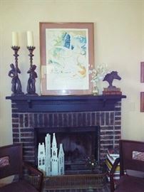 VERY LARGE SALVADOR DALI, BLACKAMOOR CANDLE HOLDERS, IRON HORSE AND BELOW IS AN ANTIQUE PIERCED BRASS FIREPLACE FENDER