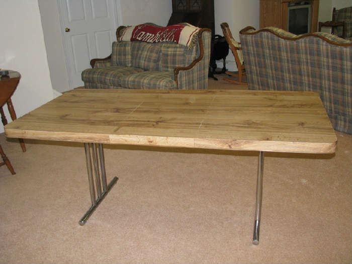 Table size 35" by 53" closed. With leaf 35" by 70".