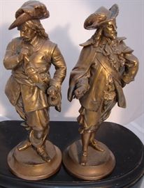 Pair of brass Musketeers. They will be sold individually.