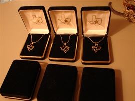 Six boxed Texas necklaces, gold color. Great gifts.