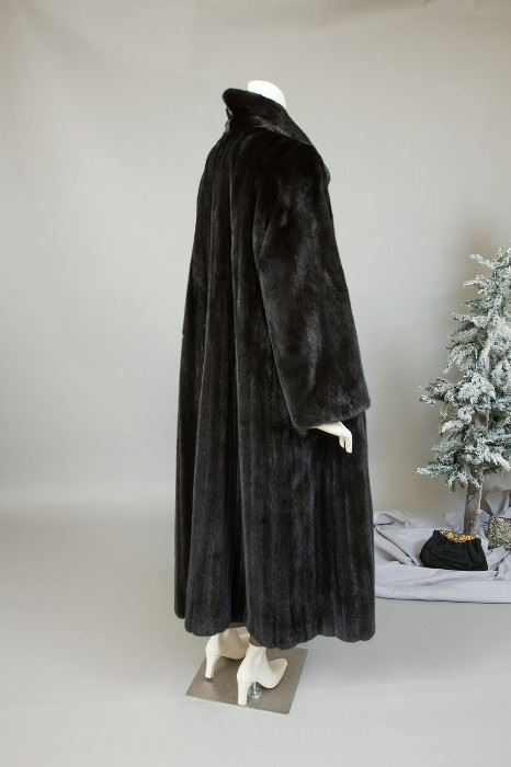 Georgous opera length black gamma mink coat from Mouratidis Furs. Generous swing. Lush pelts.