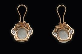 Opal and diamond ear clips. Prongs have been clipped off.