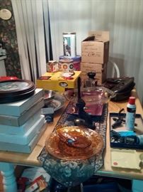 Collectable plates, boxes of hot sauce, Amber depression glass, 100yr old riveting tool.