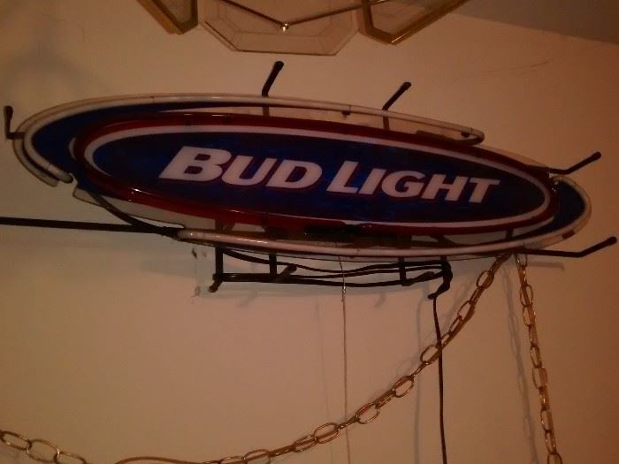 Neon Bud sign. Surf Board style