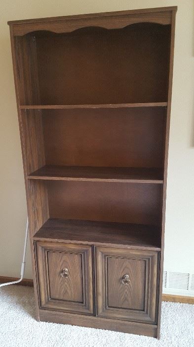 This is one of two nice, shelving units, probably from the 70s but possibly newer.