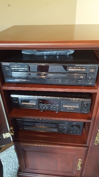 Entertainment system in cabinet. 