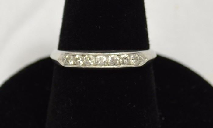 14K band with diamonds.  We have two cases full of jewelry.