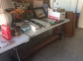 Pictures, decorative flowers, medical books & information pamphlets, Medline & Welch Allyn artery & blood pressure cuffs with stethoscopes.