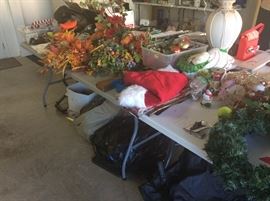 Garage - more decor, Christmas, caps, camouflage and orange vests, tree skirt, Christmas fabric, empty tubs - with & without lids